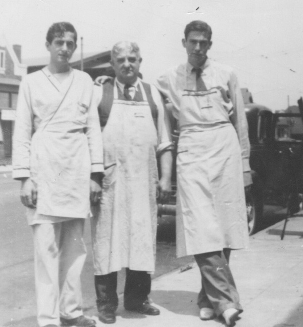  My father grew up working in his father’s stores. Here he is with my grandfather and uncle, dressed for work, about 1934.