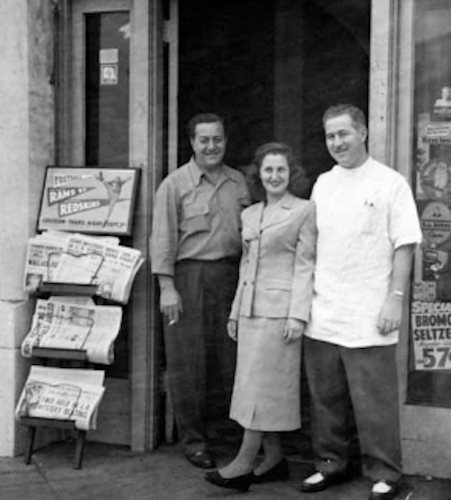 The Litvak family in front of the pharmacy in 1950