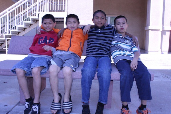 Participants in the Sacramento Building Healthy Communities Youth Media Team photo workshop at Lemon Hill Mutual House Apartments