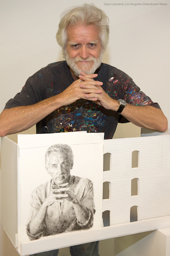 Muralist Kent Twitchell with the mural he plans to paint of artist Ed Ruscha on a building in downtown Los Angeles.