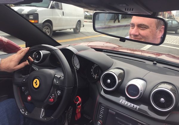 Joe Mathews driving a Ferrari California T. Photo by Louis Wheatley.