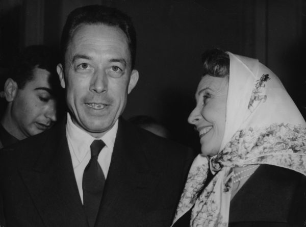 French writer Albert Caumus, after he was announced as the winner of the Nobel Prize for literature, with the French actor Madeleine Renaud, in Paris on Oct. 17, 1957. Photo by Godot/Associate Press. 