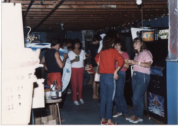 Teens partying in a family basement with video games in 1985. Photo courtesy of Richie Wiebke.