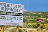 A sign on the left that says "Available for Sale or Development"